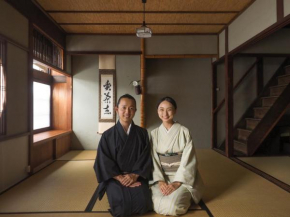 Гостиница Kyoto Machiya Cottage Karigane  Киото